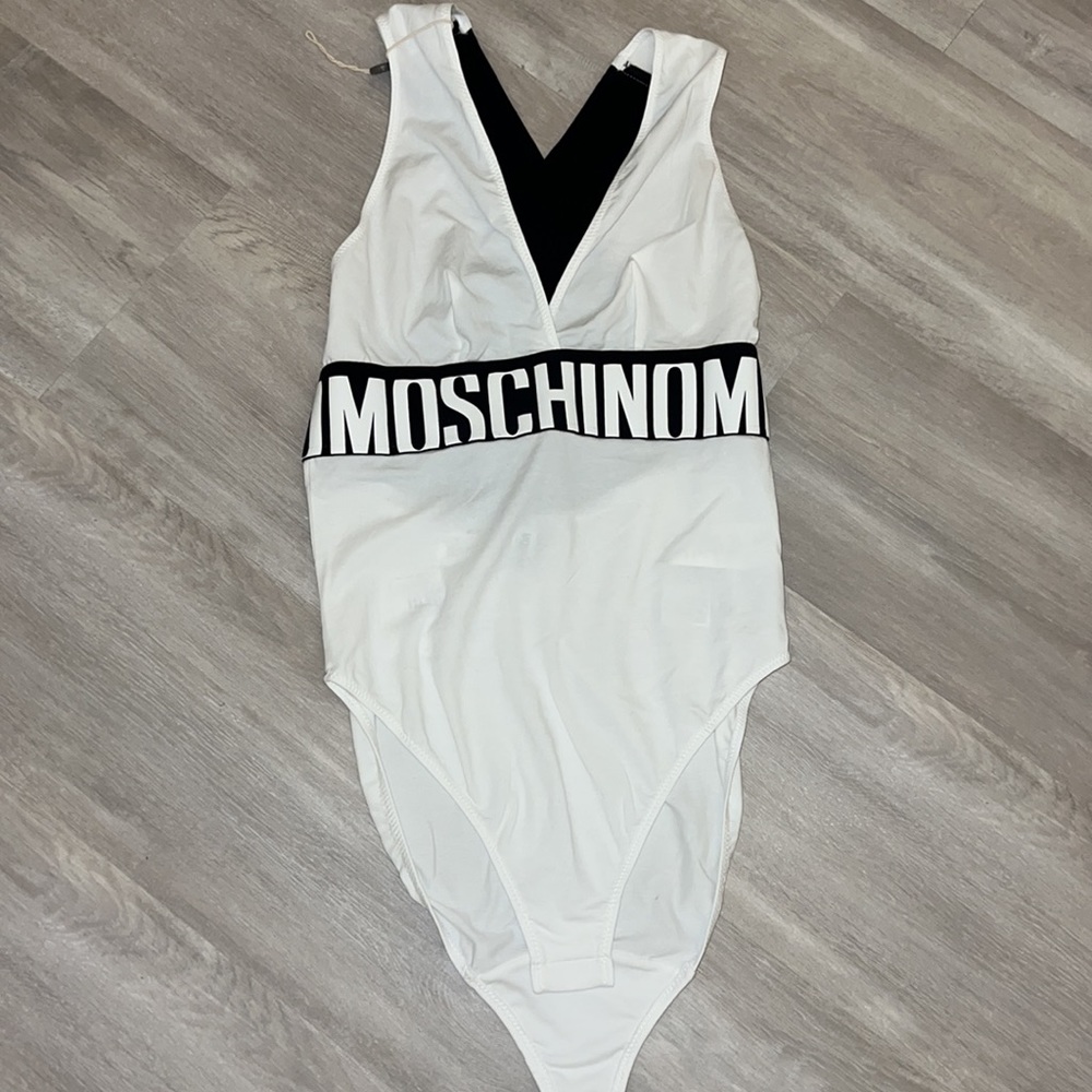 white and black moschino bodysuit